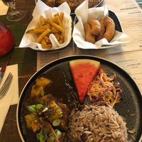 Organic jerk tofu with seasoned fries and dumplings at Turtle Bay in Derby
