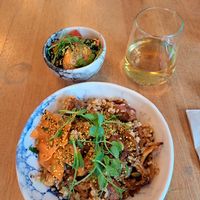No duck rice with side salad and kombucha at Pequeno Café e Bistrô - Arroios in Lisbon