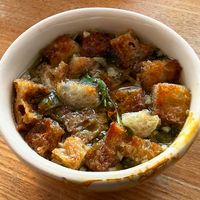 Soup of the week with coriander and croutons. at Pequeno Café e Bistrô - Arroios in Lisbon