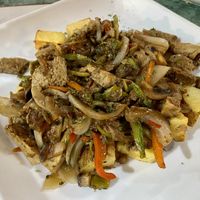 Trueno- local dish with mix of seitan, potatoes and veggies  at Estrella Negra in San Pedro De Atacama