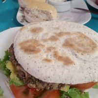 Soy burger, multi-coloured salad and garlic sauce (all vegan) at Estrella Negra in San Pedro De Atacama