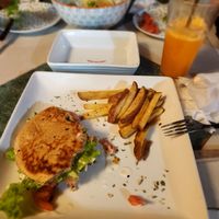 Hamburger sandwich with fries at Estrella Negra in San Pedro De Atacama