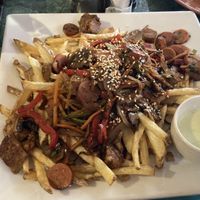 Stir fried veggies and fries. Like poutine  at Estrella Negra in San Pedro De Atacama