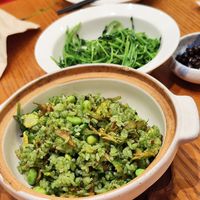 Fried rice with edamame, mushrooms and vegetables and ginger fried pea shoots at Vegegood 素来很好 in Shanghai