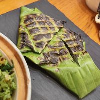 Their top rated dish - some kind of smoky seitan with herbs cooked in this leaf at Vegegood 素来很好 in Shanghai