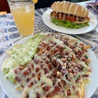 Fiesta fries with lentils, pico, avo and sauce. at Salud Para Vida in San Pedro La Laguna