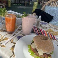 Burger, strawberry smoothie and carrot juice  at Salud Para Vida in San Pedro La Laguna