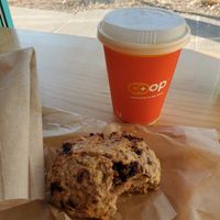 Vegan blackberry scone. Coffee with soy creamer. at The Wedge Community Food Co-op in Minneapolis