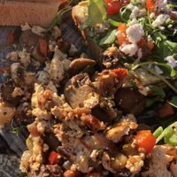 Tofu scramble and hummus toast with vegan feta   at Cafinho in Piran