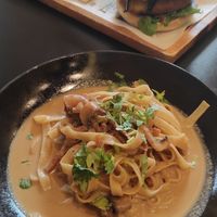 Pad Thai. Burger with 'no chicken' in the background. at Street & Soul in Toledo