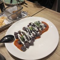 Gnocchis morados (y croquetas en el fondo)  at Street & Soul in Toledo