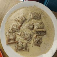 Raviolis de boletus con salsa de trufa at Street & Soul in Toledo