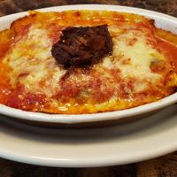 Plant based 'beef brisket cannelloni', with our own pb pasta, house made marinara, topped with pb cheese and a dollop of demi glace relish. at Sonoma Wine Shop - La Bodega in Sebastopol