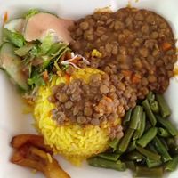 Vegan lunch of the day: rice, lentils, green beans, fried plantain and salad. at Patrick's in St Georges