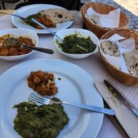 Cauliflower & potatoes with Spinach and potatoes,  roti and chapati bread at Dawat in Tavira