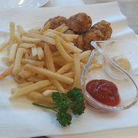 karaage and fries at KOMEDA is in Tokyo