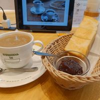 Coffee with "milk", toast with adzuki jam and above the tablet through which you order. at KOMEDA is in Tokyo