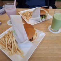 Chicken tartar burger and curry mayo burger were AMAZING.  With two really yummy smoothies. at KOMEDA is in Tokyo