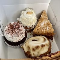 Tuxedo cupcake, banana coconut cupcake, apple cardamom cake and cinnamon roll. The apple cardamom tasted like potpourri. It was awful and a waste of $6. The cupcakes were dry    at Wholesome Bakery in San Francisco
