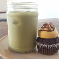 Turtle cupcake and macha latte at Wholesome Bakery in San Francisco