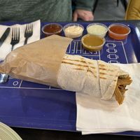 Wrap with all Sauces!! Sweet Chilli / Garlic Herb Mayo/ Sriracha Mayo/ Plum Sauce/ Sweet Mustard (Not Pictured was the also Tasty Cheese Sauce)   at Warzywina in Gdynia