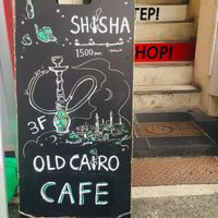 Entrance sign at Old Cairo Cafe in Osaka
