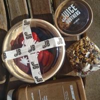 Bowl, cocoa smoothie and energy ball at JuiceBrothers - Herengracht in Amsterdam