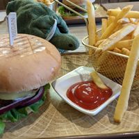 Beyond burger with vegan cheese, mayo, BBQ sauce, salad and fries at Loving Hut in Reykjavik