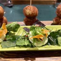 Croquetas o albóndigas de lentejas y soja texturizada con mayonesa de wasabi. Delicioso    at Creperia Lilot in Soria