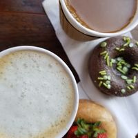Vegan Pumpkin Spice Latte, Vegan Pumpkin Coffee, Vegan Chocolate Donut, Vegan Strawberry Donut at Cafe 1610 in Dayton