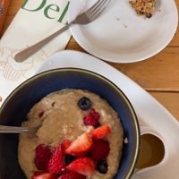 Oat milk porridge with a flapjack  at Ness Deli in Drumnadrochit