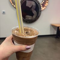 Vegan peanut butter chocolate milkshake with Oreo mixed in  at Buzzed Bull Creamery in Pigeon Forge