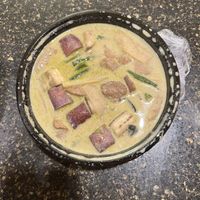 Green curry with veggie duck  at Hug Thai Cuisine in Bellmore