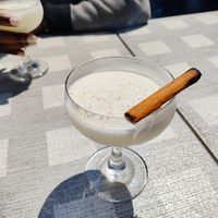 Liquid Pearl  $16  |  lavender orgeat, lime juice, El Dorado rum, coconut milk, shaved nutmeg, cinnamon stick at Monarch in Brooklyn