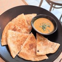 Brunch menu: Roti with onion curry  at Monarch in Brooklyn
