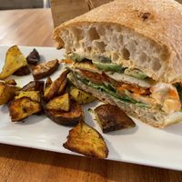 Half Tofu sandwich with roasted potatoes.  at PS Green Express in Fort Lauderdale