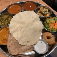 Vegan Meals (from the left, Veggie curry, Broccoli mash, Sambor, Lasam, Chick pea salad, Green salad, Vada with Coconut Chutney, Papadom over Basmati Rice and Chpati) at Erick South in Tokyo