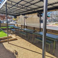 Extensive patio with a small parking lot out back. at Bento Picnic in Austin