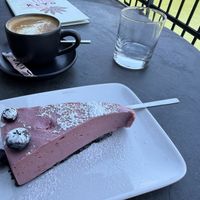Raspberry Mouse Tart with oat milk cappuccino   at KLYO in Vienna
