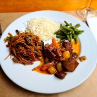 Seitan Bourguignon, noodles, green beans and rice. at GAO in Matosinhos