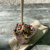 Coffee Oreo with rainbow sprinkles   at Sweet Izzy in Harwich Port