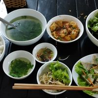 Fake pork sausage + all the sides you get. Huge meal! at Cumulus Vegetarian Restaurant in Hanoi