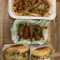 Poutine, sweet chilli drumsticks, and burgs  at Veg Out in Surrey