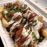 Butter chicken poutine   at Veg Out in Surrey