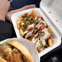 Buffalo chicken poutine and crispy chicken burger  at Veg Out in Surrey