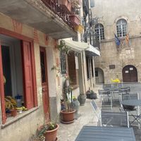Outdoor seating area  at Le Vegetarien in Villefranche-de-conflent