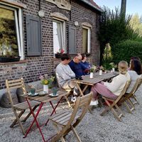 Outdoor sitting area at 'wilde tijm' at Wilde Tijm in Kruisem