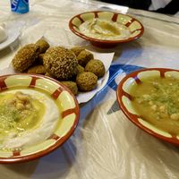 Falafel, Falafel filled with red onions, Babaganoush and Hummuss  at Hashem in Amman