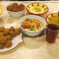 Falafel, houmous, foul, fatteh with oil (and fetteh with meat) at Hashem in Amman