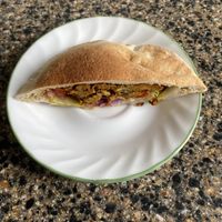 Half the shawarma pita at Eat Nabati in Toronto